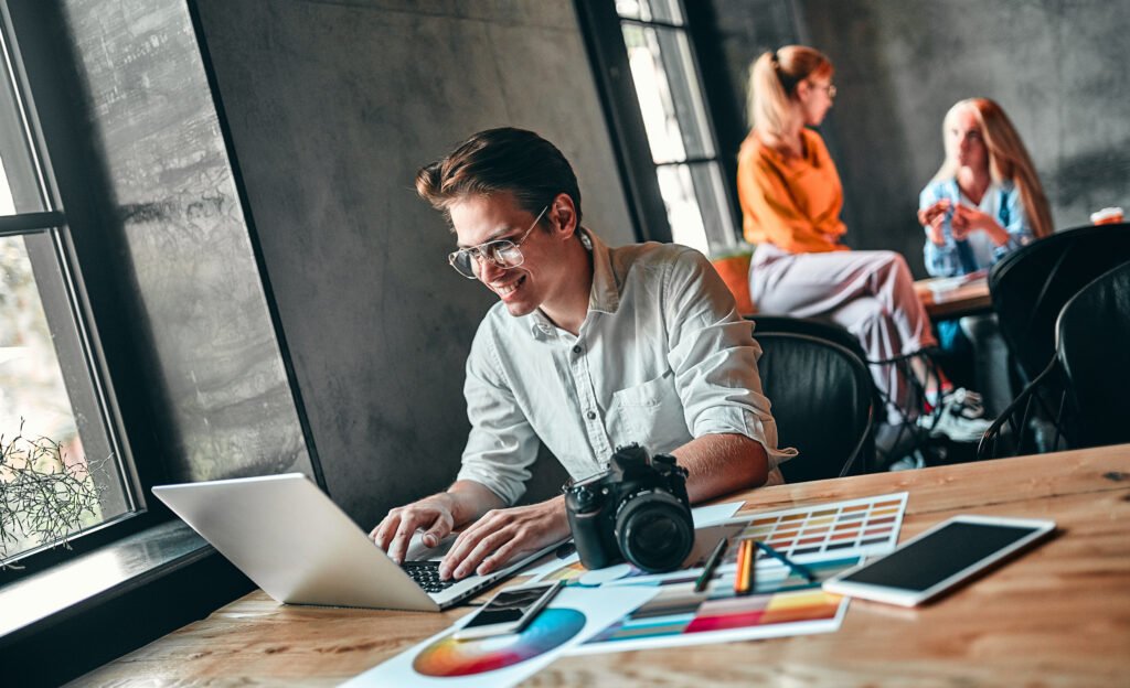 Young cheerful photographer