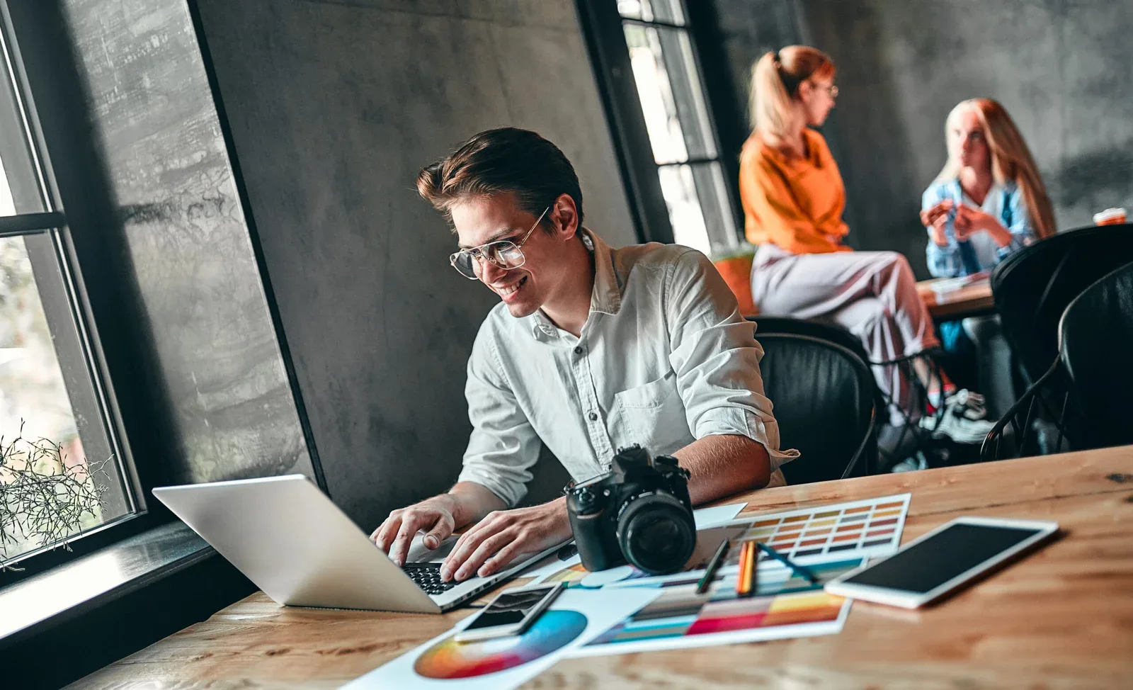 Young cheerful photographer